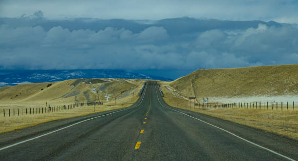 istock interstate freeway runs across the montana countryside towards the distant hills 1218737736