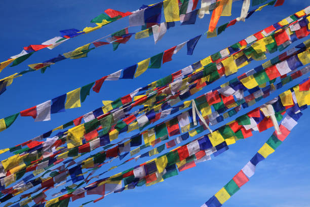 istock Tibetan Buddhist prayer flags against  blue sky 1218737778