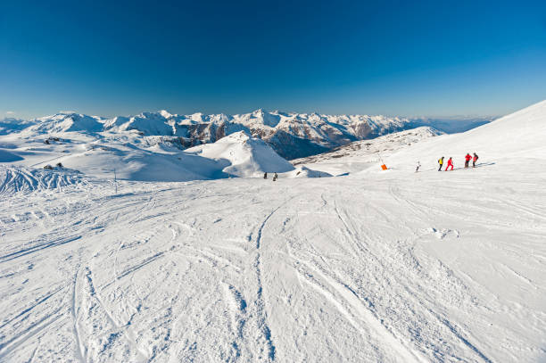 istock View down a piste in alpine ski resort 1218739378