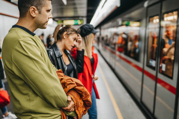 istock Friends on train station 1218741915