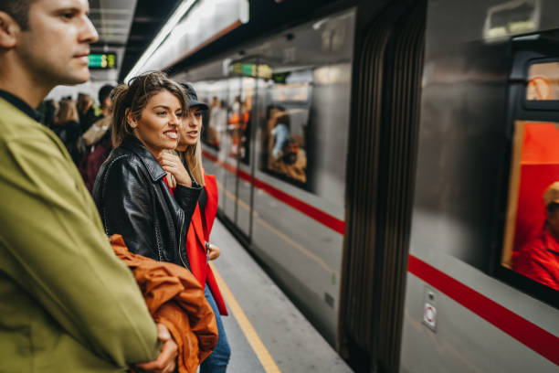 istock Friends on train station 1218742431
