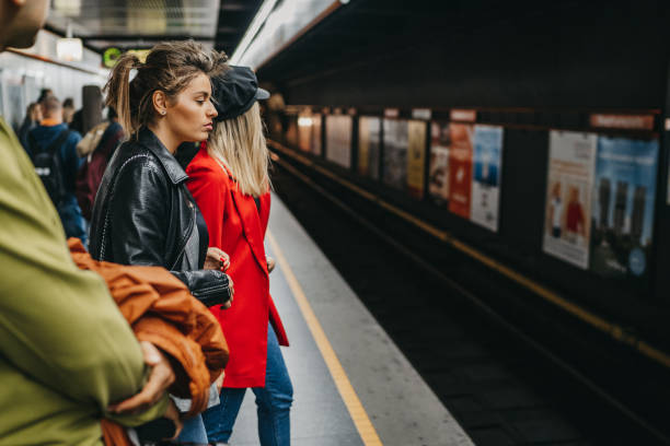 istock Friends on train station 1218742574