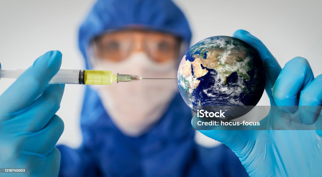 Coronavirus vaccine for the world Doctor wearing highly protective suit, injecting the coronavirus vaccine to the earth. 

Globe link: https://visibleearth.nasa.gov/images/2181/the-blue-marble/2182w Vaccination Stock Photo