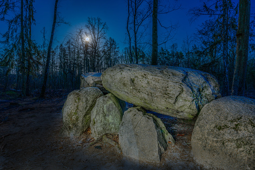 Prehistoric megalith dolmen Teufelskueche (devils kitchen) near Haldensleben with full moon at night
