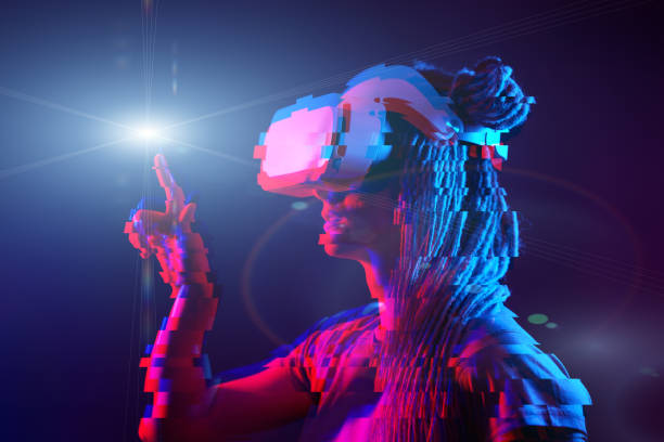 istock Woman is using virtual reality headset. Neon light studio portrait. Image with glitch effect. 1218745624