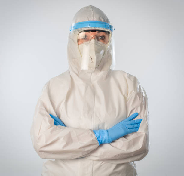 istock Doctor wearing highly protective suit during coronavirus COVID 19 novel corona virus outbreak 1218746984