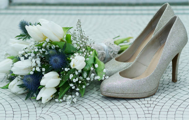 Vintage bridal bouquet & Shoes on a mosaic floor