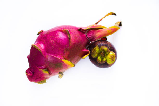 istock two dragon fruit on a white background, tropical fruit 1218756191