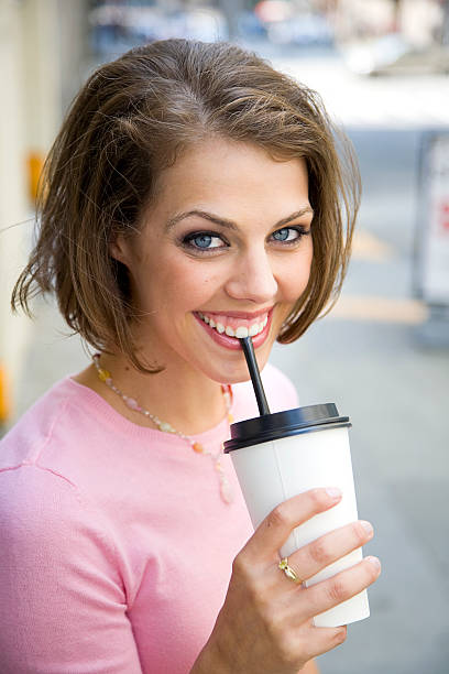 istock Young Woman Drinking Coffee 121875630