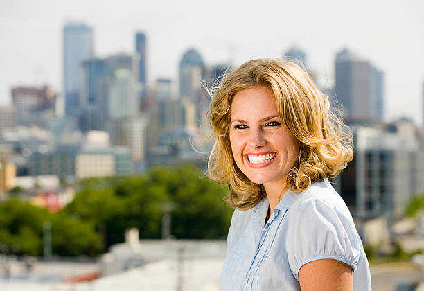 istock Blond Woman with Skyline 121875690