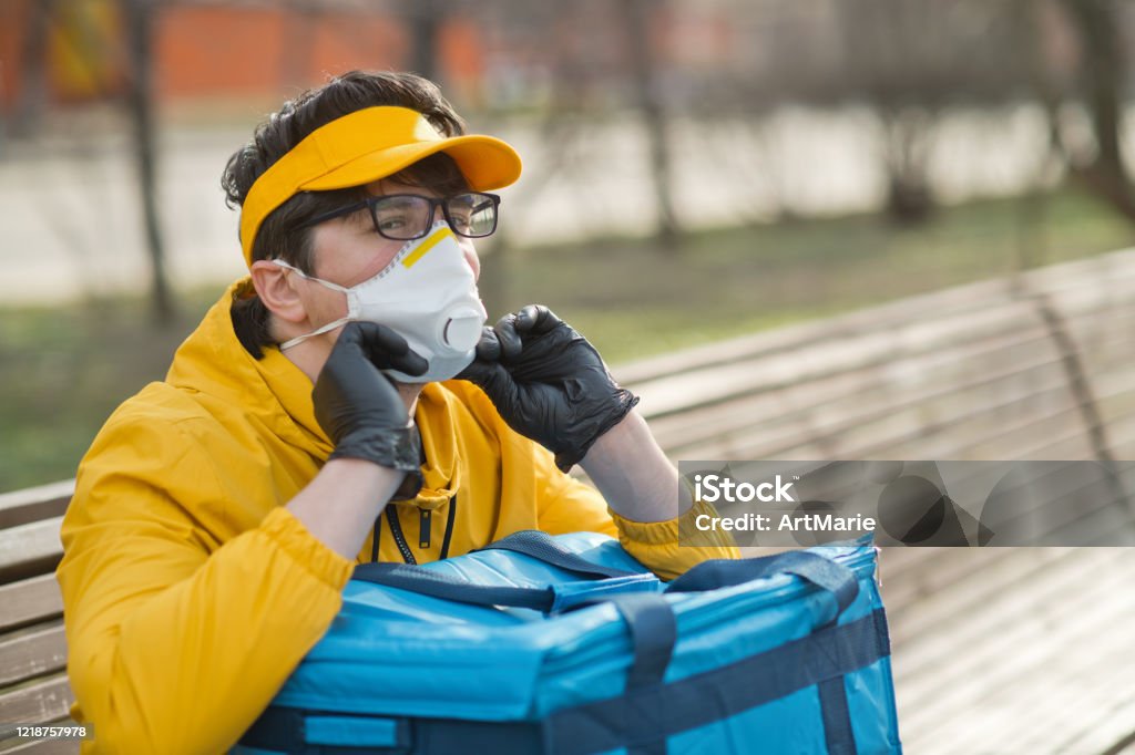 https://media.istockphoto.com/id/1218757978/photo/delivery-man-wearing-protective-mask-and-rubber-gloves.jpg?s=1024x1024&w=is&k=20&c=uQ-5NrNjHiYR-tANgYU2sM0xT_sduRw9WewoikGQ-Zc=