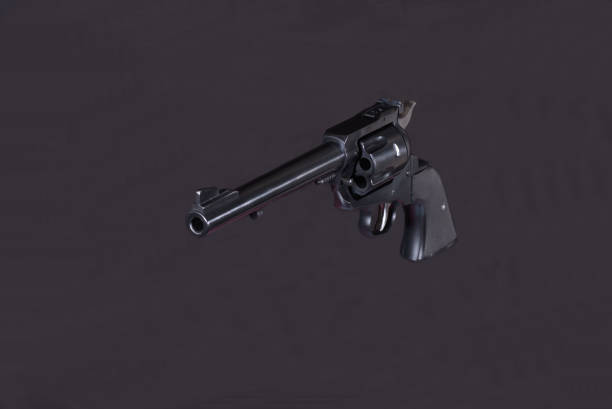 istock 357 magnum revolver suspended in  black background 1218758734