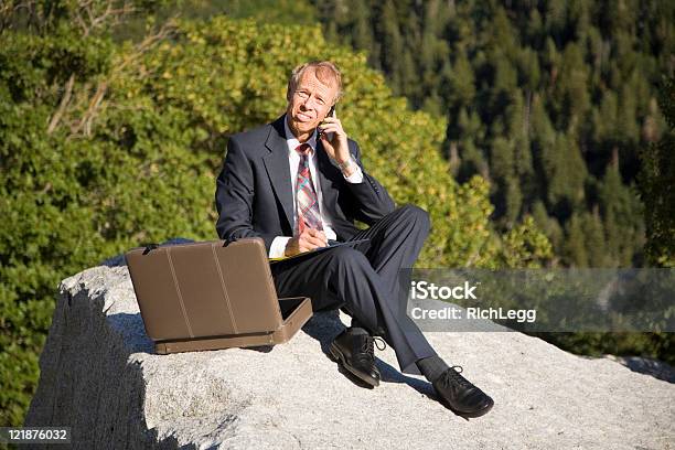 Business Person In Wilderness Area Stock Photo - Download Image Now - Redhead, Senior Men, Suit