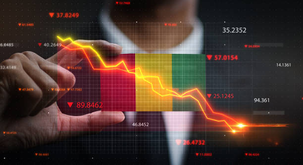 istock Graph Falling Down in Front Of Guinea Flag. Crisis Concept 1218760873