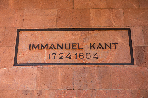 Kaliningrad, Russia - June 20, 2019: Mausoleum and grave of Immanuel Kant, German philosopher, founder of classical philosophy outside of the Koenigsberg Cathedral in Kaliningrad.
