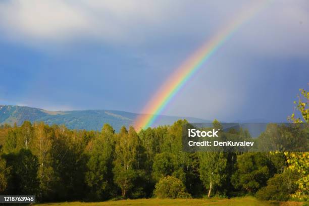 Natural Rainbow In The Mountains Stock Photo - Download Image Now - Rainbow, Rain, Landscape - Scenery