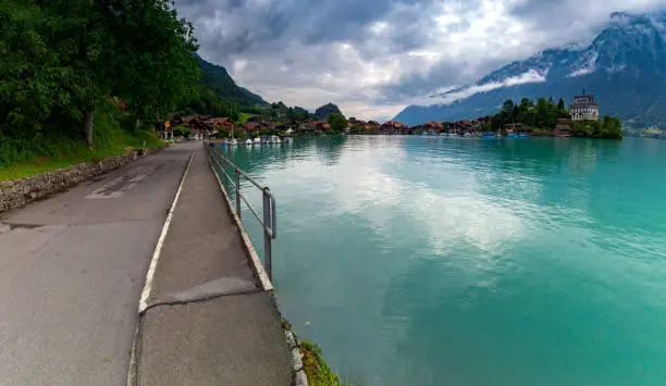 Panoramic view of the Swiss village of Iseltwald on the famous lake Brienz. Switzerland.