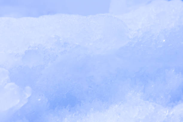 istock Fresh fluffy white snow texture.White snowflakes.Snow surface.soft focus. 1218765967