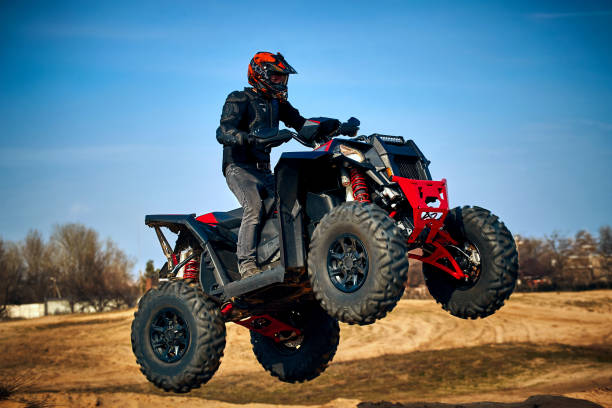 istock Racing in the sand on a four-wheel drive quad. 1218770468