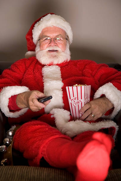 istock Santa Claus Watching Television 121877062