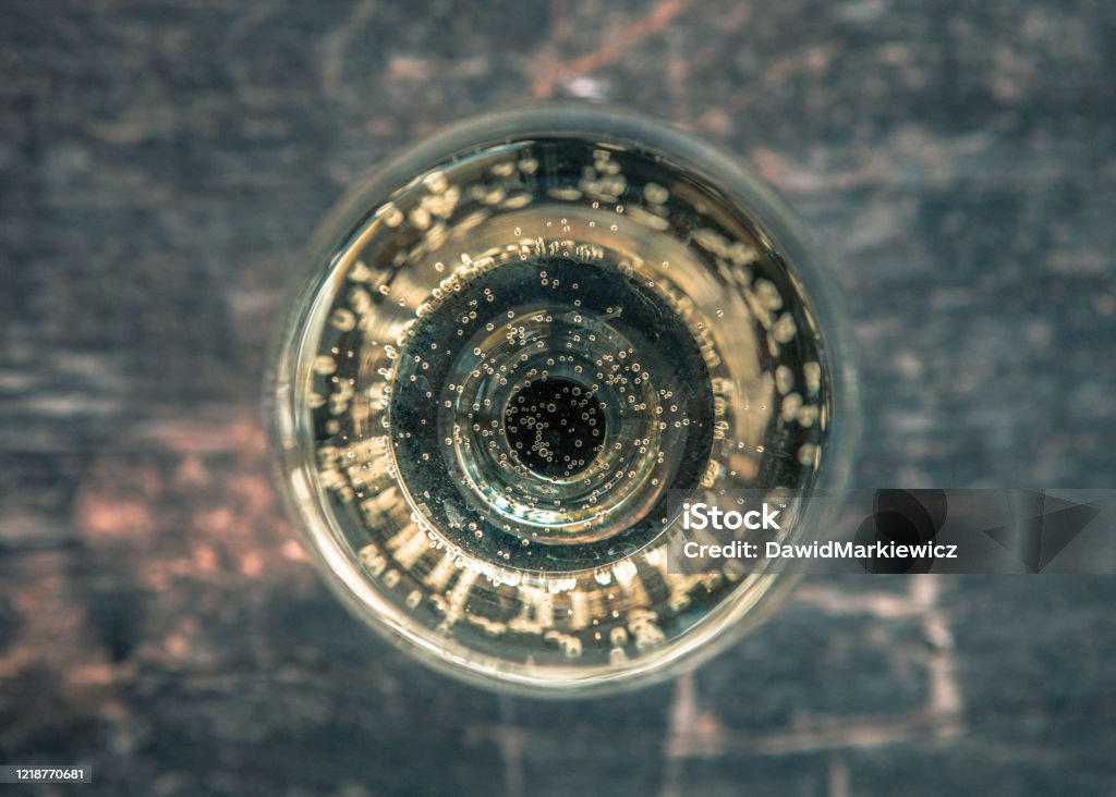 Riesling in a glass White wine in a glass. View directly from above Champagne Stock Photo