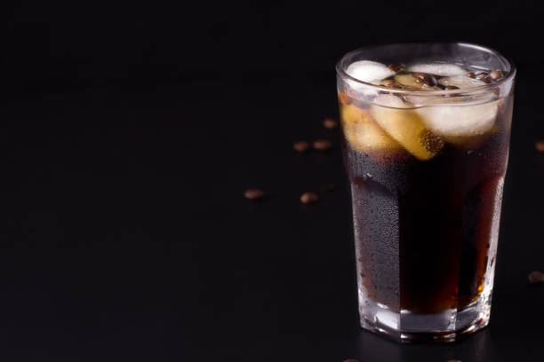 istock coffee with ice on a black background. There is a place for copy space. 1218771877