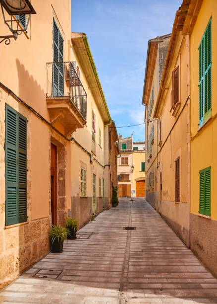 istock Empty narrow street in Alcudia old town, Mallorca. 1218772835