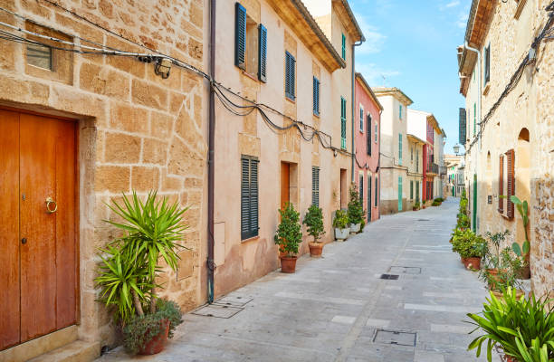 istock Empty narrow street in Alcudia old town, Mallorca. 1218772885