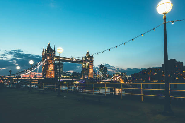 istock Tower bridge with Thames river during sunset in London UK 1218773604