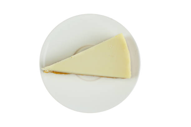 istock classic cheesecake on white plate on  wooden table 1218773810