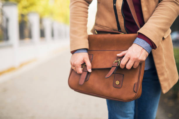istock Close up of a businessman opening a briefcase. 1218774471