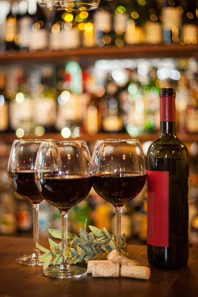 istock glasses of red wine in restaurant 1218783972