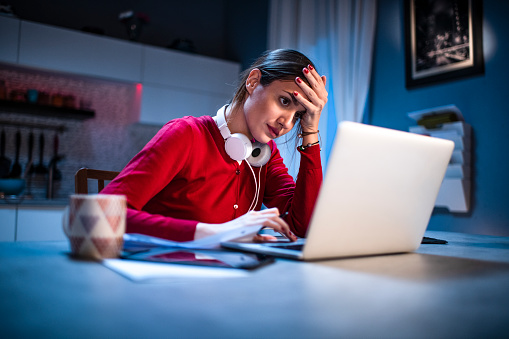 https://media.istockphoto.com/id/1218784333/photo/young-woman-stressed-while-working-at-home-late-at-night-during-a-virus-outbreak.jpg?b=1&s=170667a&w=0&k=20&c=oRWZng6ASWLk9-bMNlZAVXO9bqYUZbASPjx4dBH5R78=