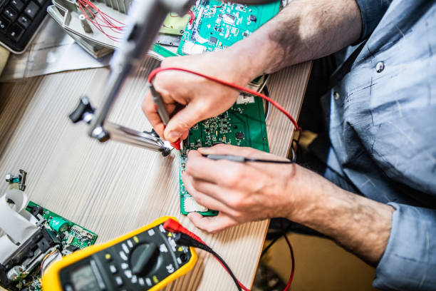 istock Electrician Is Repairing Some Items From His House 1218786191