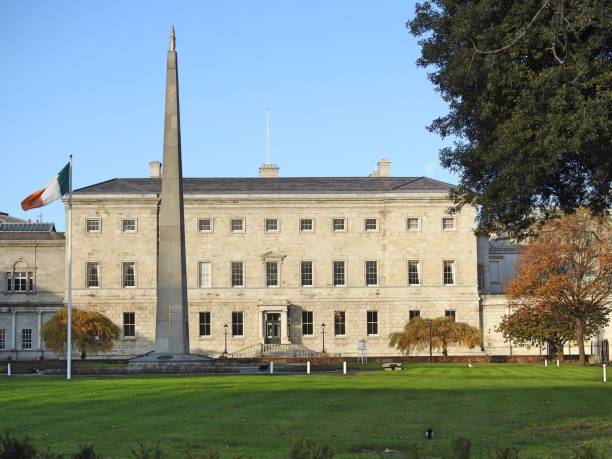 Leinster House 13th April 2020, Dublin, Ireland. Leinster House or the home of the Dail, the government of Ireland, with the Cenotaph to leaders of Irish independence monument in front, on Merrion Street, Dublin. coalition building stock pictures, royalty-free photos & images