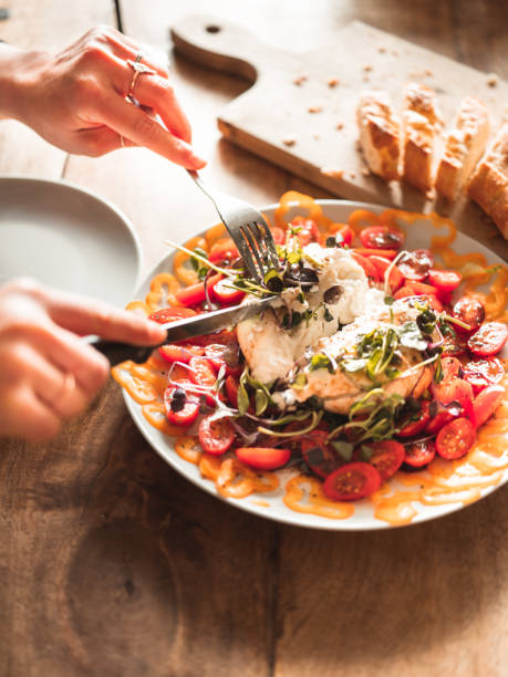 istock Eating Burrata Italian style lunch 1218787843