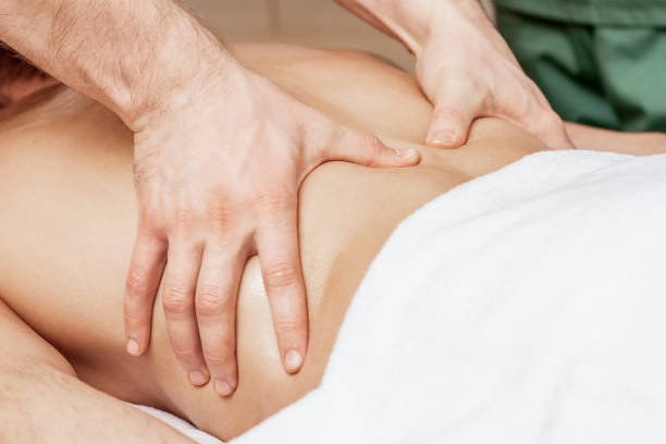 istock Back massage on back of man. 1218790476