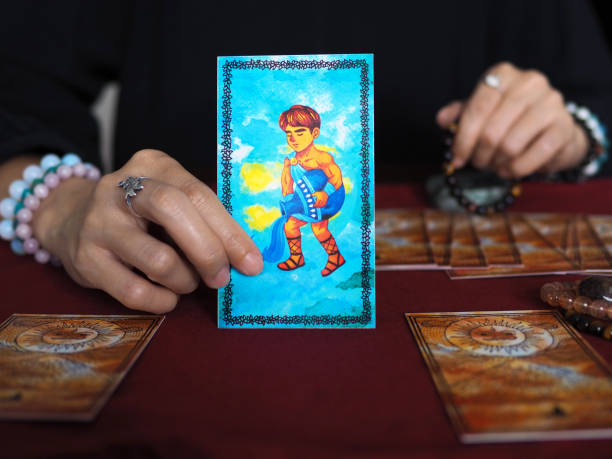 istock tarot card reading aquarius horoscope fortune teller astrologer divination selected focus 1218794816