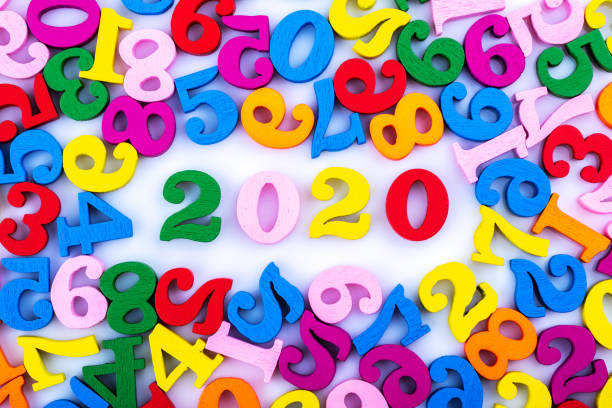 istock Numbers 2020 among randomly scattered, isolated on a white background. Close up. 1218798262