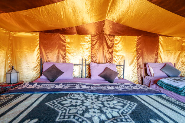 istock Beds inside elegant tent set on Sahara desert, Morocco 1218801886