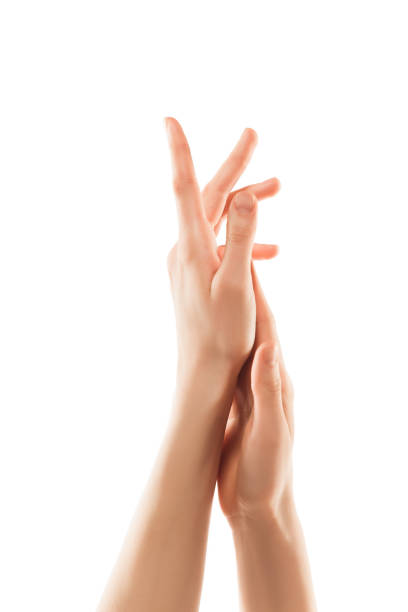 istock Beautiful female hands isolated on white background 1218803994