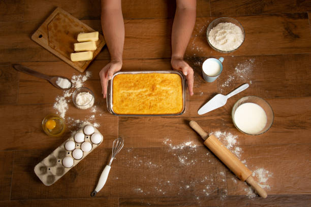 istock cake with ingredients around on wooden background 1218804859