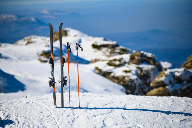 istock Skis in snow at mountain top 1218804922