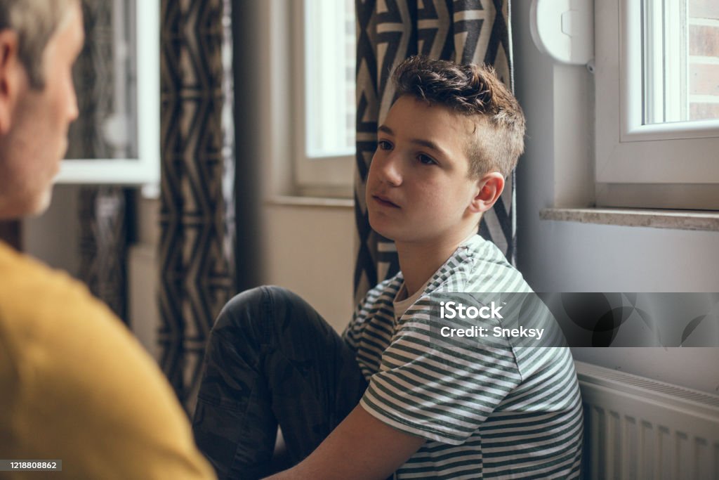 Father and son time Teenager Stock Photo