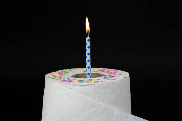 birthday candle on toilet paper