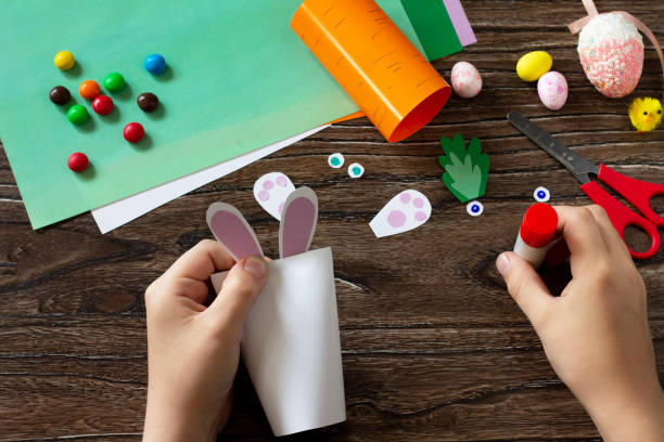 istock Instruction, step 8. Making the packaging in the form of carrots and the Easter Bunny. Handmade. Project of children's creativity, handicrafts, crafts for kids. 1218811565