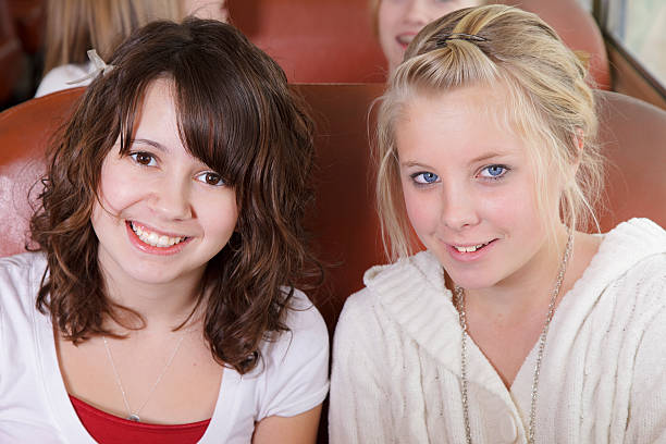 istock Young Girls on a School Bus 121881238