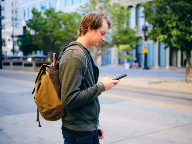 istock Millennial Man in Urban City Environment 1218815410