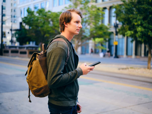 istock Millennial Man in Urban City Environment 1218816016