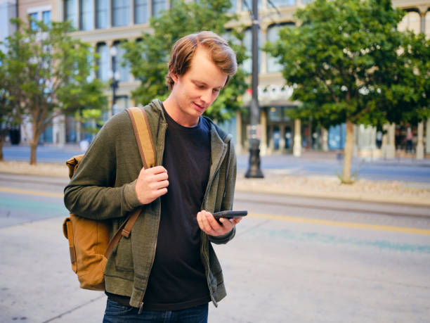 istock Millennial Man in Urban City Environment 1218816099